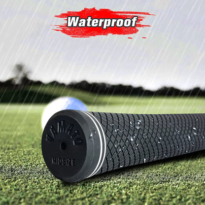 Yamato red golf grip on wet grass in rainy weather, showcasing waterproof all-weather performance